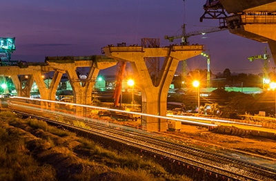 HazTek Jobs - Nighttime bridge construction in progress.